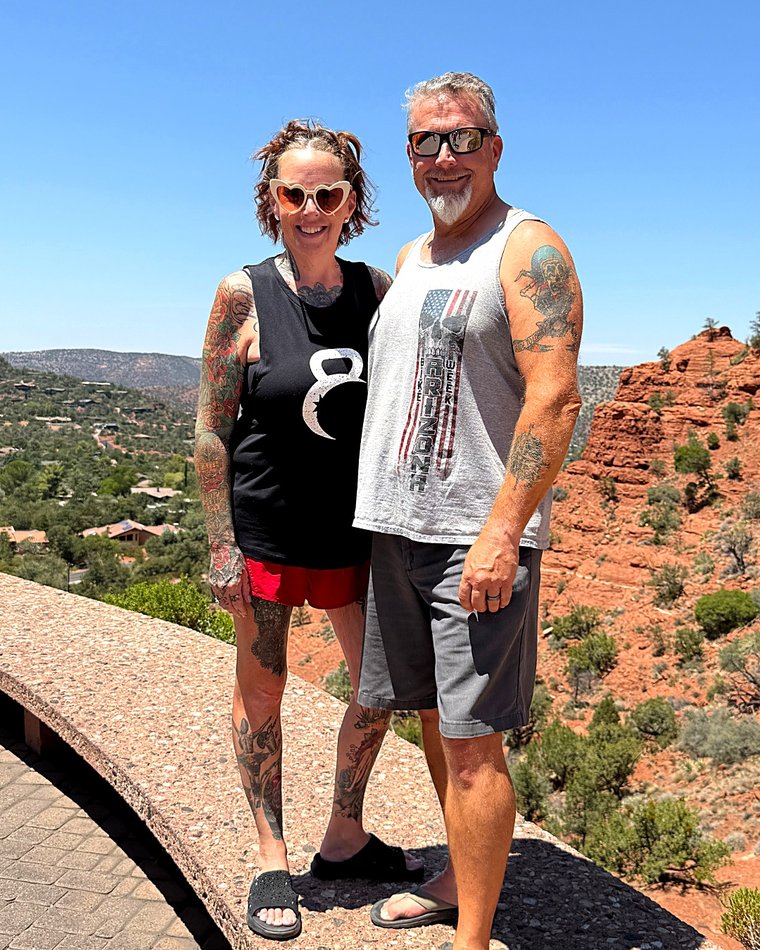 Traci and Greg at a red-rock overlook in Sedona, Arizona
