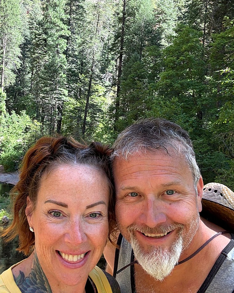 Traci and Greg on a forest creek hike